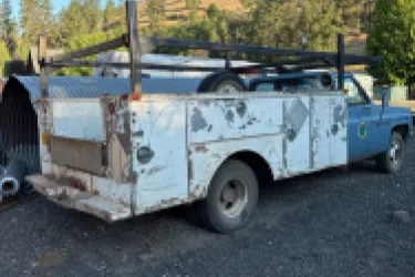 Image of right rear of shop truck