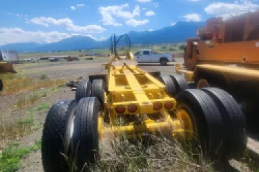 Image of lowboy tires and axle