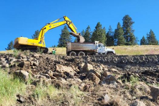 Uphill view of excavator